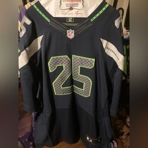 NFL jersey from the team the Seattle Hawks. The team mate is Richard Sherman.